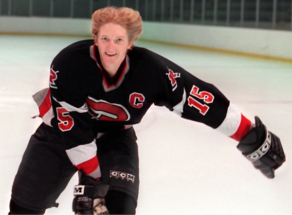 PAUL MARTIN of ELK RIVER is metro player of the year. All-Metro photo shoot ... six players will be coming at staggered times, 4:30 p.m., 4:50 and 5:20 ... what we want to do is shoot action shots of each doing something pertaining to their position -- forwards shooting, defensemen diving to block shots, and the goalie blocking a shot ... what we will hopefully get out of these is a spectacular back page of action shots, with short bios on each kid next to the photo and the Metro Player of the Year -- Elk River's Paul Martin -- featured most prominently -- Defenseman Paul Martin of Elk River is metro player of the year. His fourth year on varsity, he creates scoring chances, and is deceptively fast. He had 14 goals, 33 assists this season.